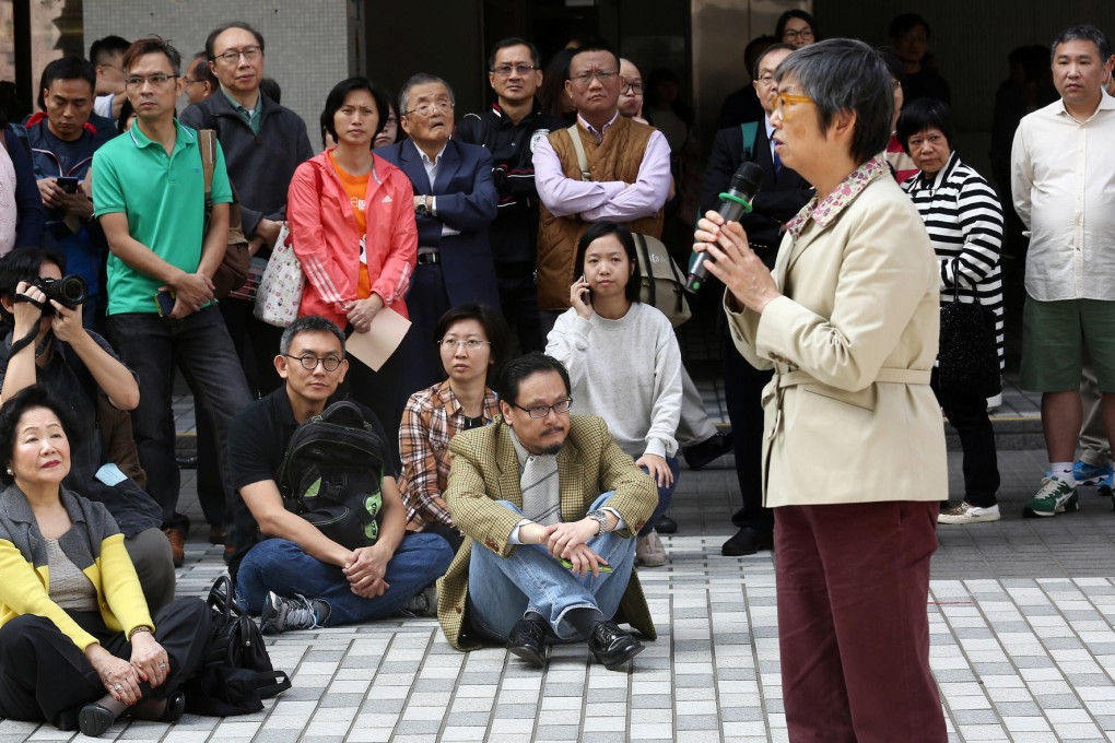 Alumni including Margaret Ng Ngoi-yee (with mic) spoke on campus to vent their concerns. Photo: Jonathan Wong