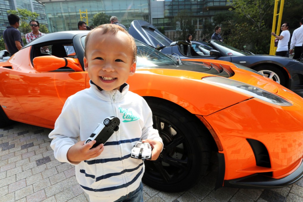 Lucas Tsao, 2, joins his father at the Charged Hong Kong 2015 Rally in Sha Tin. Photo: Edward Wong