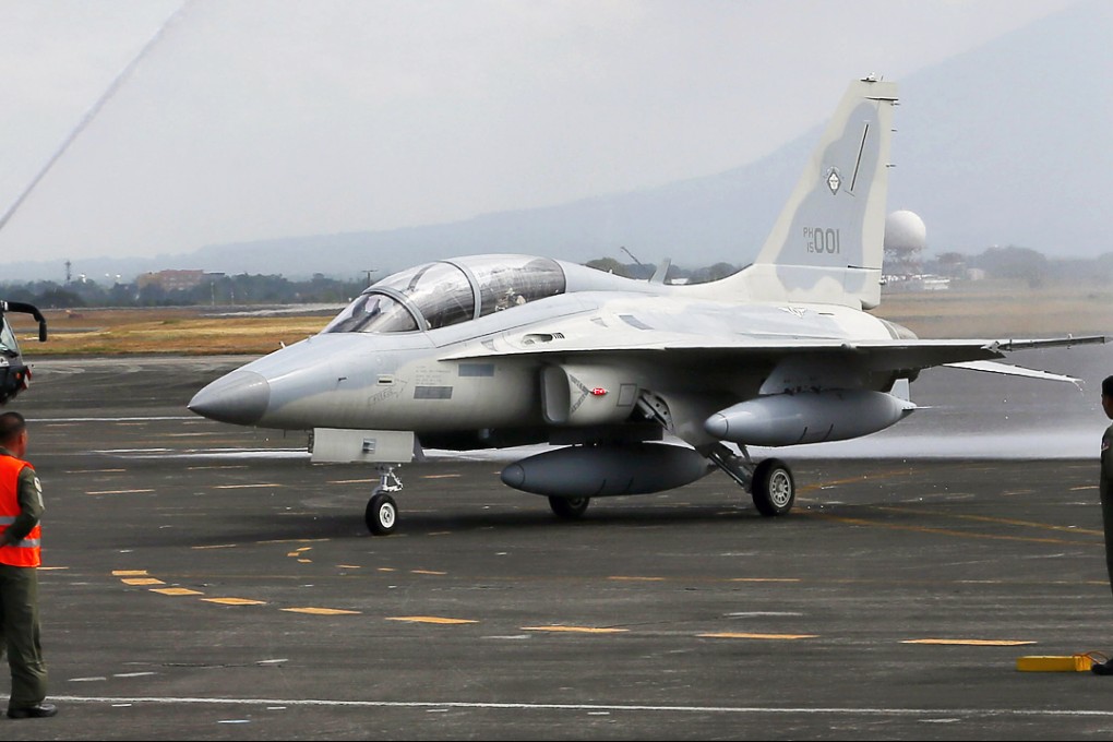 The newly-acquired FA-50PH fighter jets were welcomed with a water cannon salute at Clark Air Base. Photo: AP