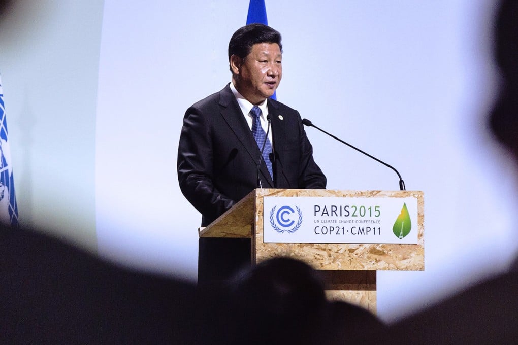 President Xi Jinping addresses world leaders at the UN climate summit in Paris on Monday. Photo: EPA