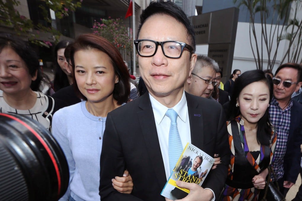 ATV executive director Ip Ka-po (centre) arrives at the District Court before he is sentenced for failing to pay wages on time. Photo: Felix Wong