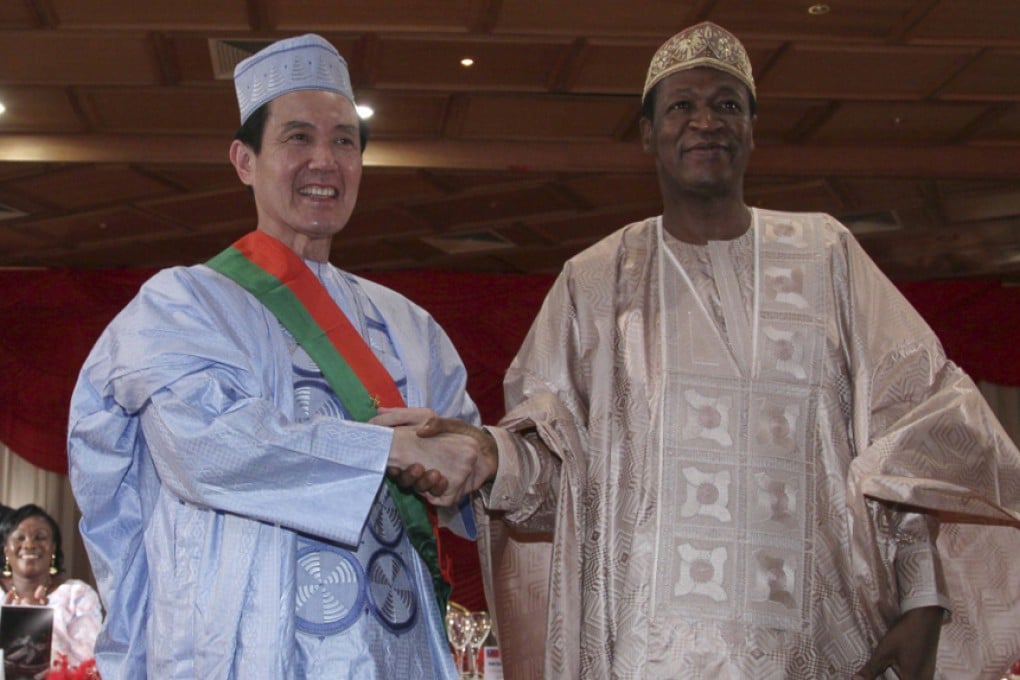 Taiwanese President Ma Ying-jeou with then leader Blaise Compaoré, during a state dinner in Burkina Faso, in April 2012. Photos: AFP; Corbis; Ivan Broadhead