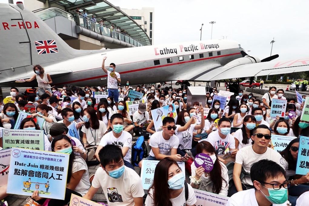 Hundreds of the airline’s flight attendants protesting in May before the latest pay deal was struck. Photo: K.Y. Cheng