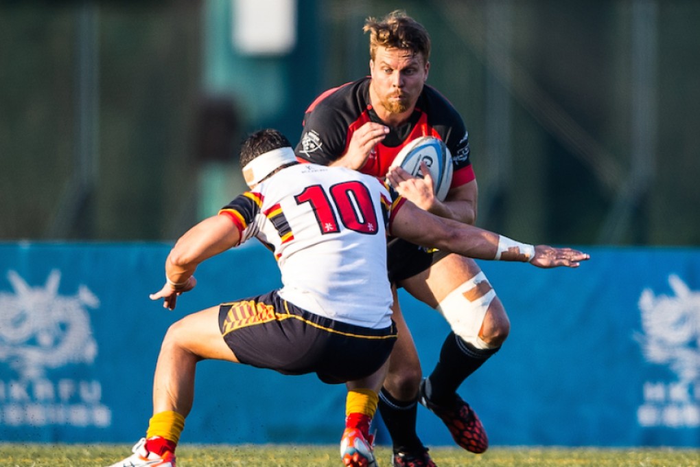 Matt Rosslee of Valley gets wrapped up by the HKCC defence and his side can look forward to more of the same against Hong Kong Scottish this weekend. Photos: HKRU