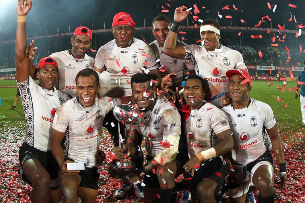 Fiji celebrate winning the Dubai Sevens following their 28-17 Cup final victory over England. Photos: World Rugby