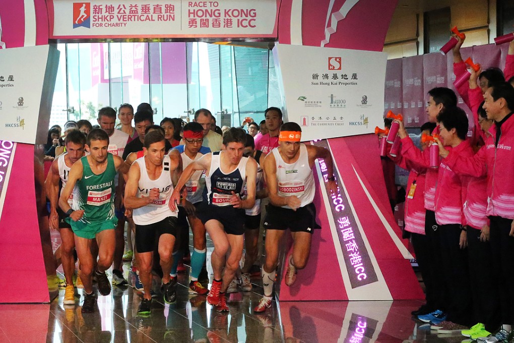 Competitors in the 2015 SHKP Vertical Run for Charity in International Commerce Centre set out on their 82 floor ascent. Photos: Edward Wong