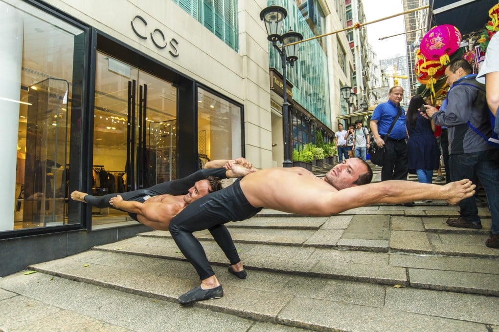 Cirque Adrenaline's strongmen Mark Flores (left) and Nikolay Nikolov put on a show in Central.