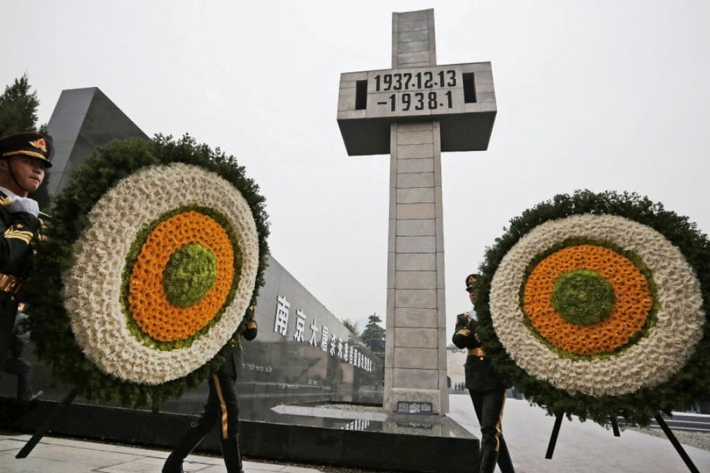 Guards place wreaths at the Nanjing Massacre Memorial Hall on the second annual national day of remembrance to commemorate the atrocity. Photo: AFP