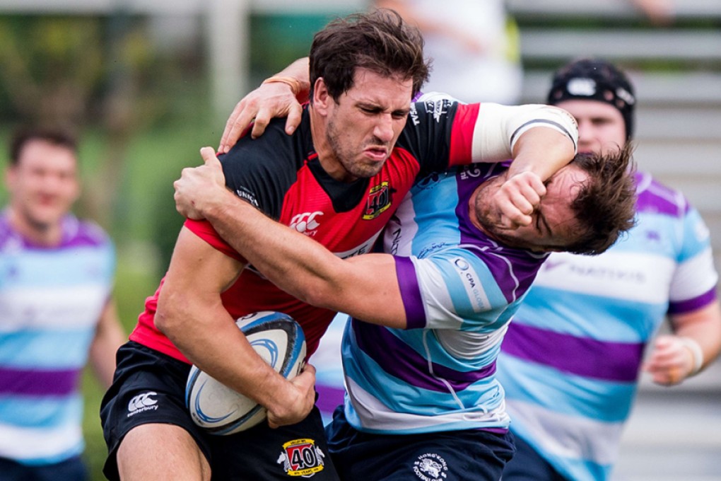 Valley centre Ally Maclay brushes off the HKFC defence in a bruising 13-6 home win on Saturday. Photos: HKRU