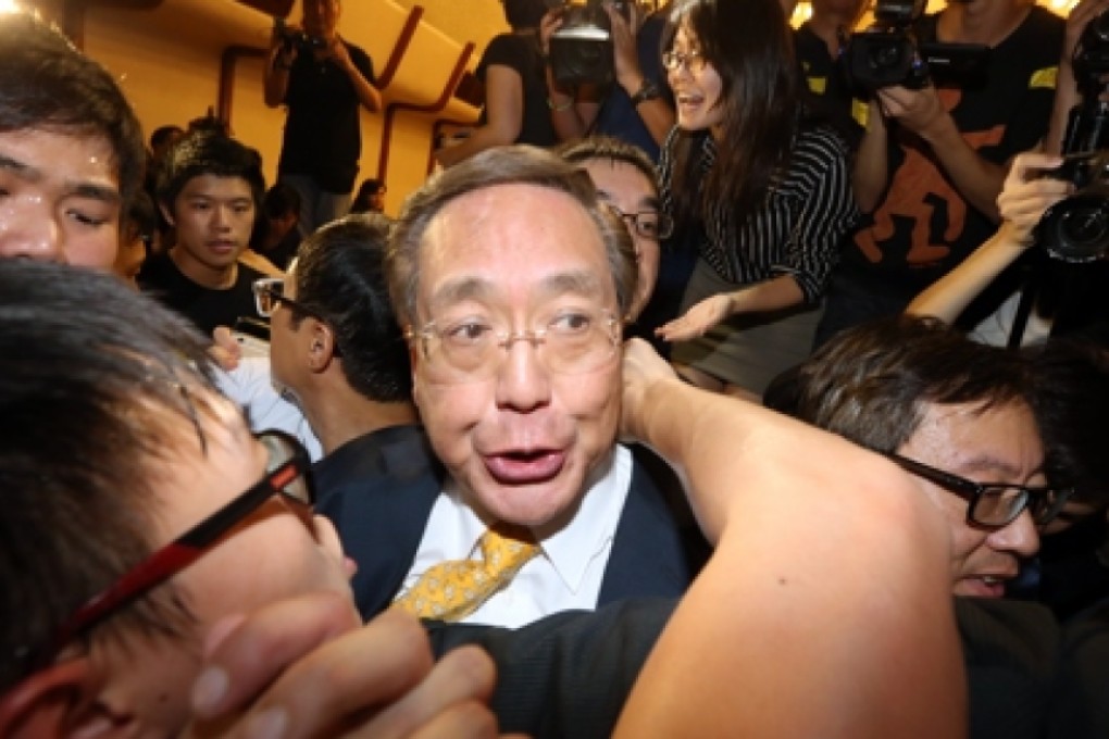 HKU council member Arthur Li Kwok-cheung in the middle of the July 28 storming. Photo: Dickson Lee