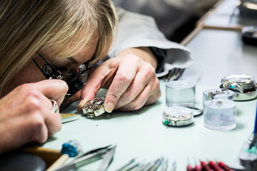 Watchmaker at work at Jaeger-LeCoultre’s manufacture in Le Sentier.