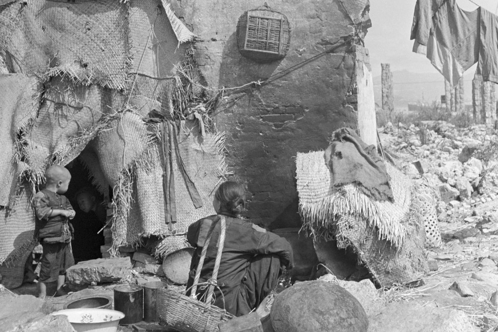 A family home in the ruins of a building in Hong Kong in 1950. Photo: Corbis