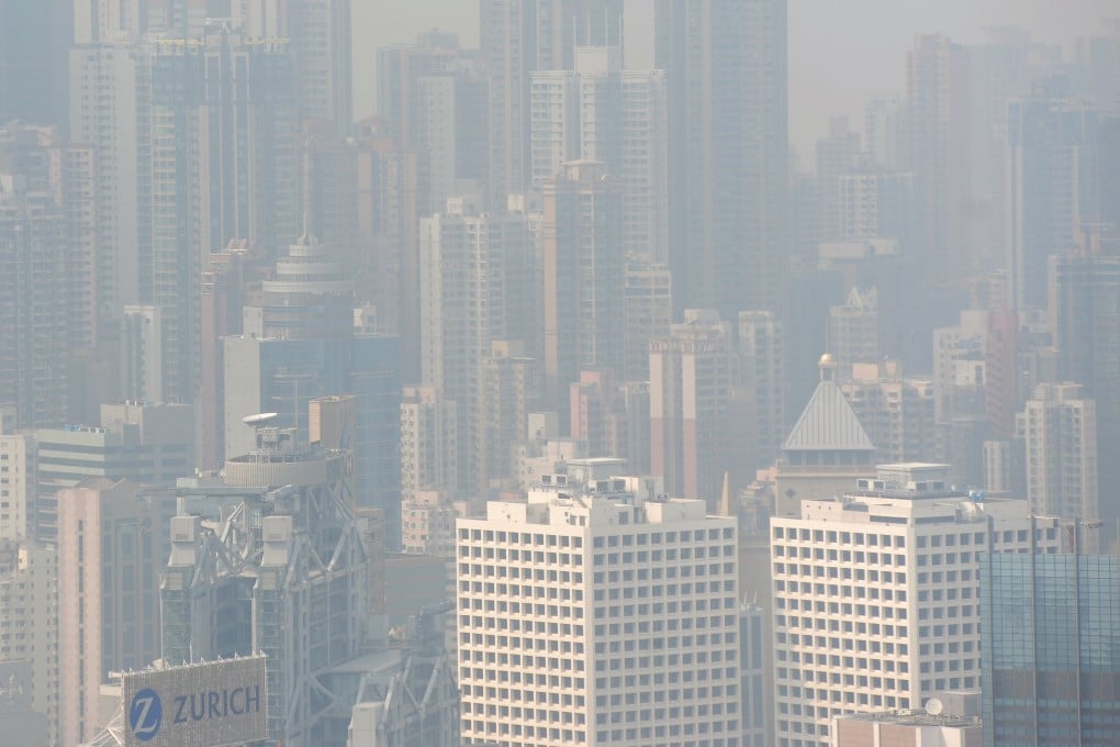High-rise developments are seen through thick Hong Kong air pollution. Concrete is so ubiquitous on our planet that every square metre of its surface would contain about 1kg of it, if the building material were spread evenly. Photo: SCMP Picture