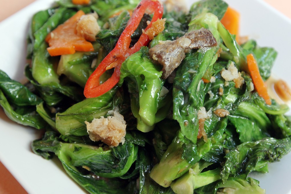 Stir-fried cabbage sprouts with salted fish at The Spice House.