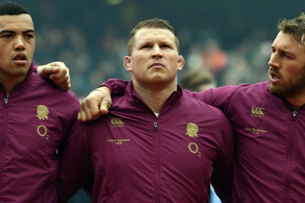 Hooker Dylan Hartley (centre) – flanked by former England captain Chris Robshaw (right) and Luther Burrell – is tipped to named Monday as skipper for the Red Rose. Photos: AFP