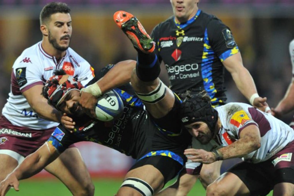 Clermont flanker Fritz Lee is tackled by the Bordeaux-Bègles defence during their European Rugby Champions Cup clash at Stade Michelin in Clermont-Ferrand on Sunday. Photo: AFP