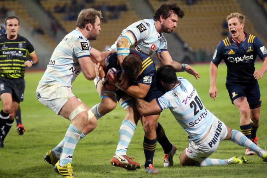 Highlanders centre Teihorangi Walden runs into the Racing 92 defence during their Natixis Cup clash at Siu Sai Wan sports ground on Saturday. Photo: Edward Wong/SCMP