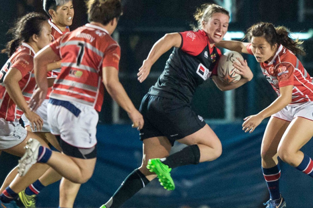 Valley Black Ladies fullback Olivia Coady baffles the Gai Wu defence by running in five tries for the two-time HKRU Women’s Premiership champions in a 49-12 romp at King’s Park on Saturday. Photos: HKRU