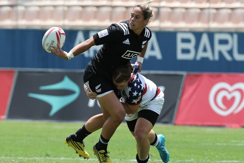 Top-scorer at the São Paolo Sevens with 11 tries and 50 points, Kayla McAlister of New Zealand offloads under pressure en route to dotting down one of the scores of the week in all forms of rugby. Photo: FotoJump for World Rugby