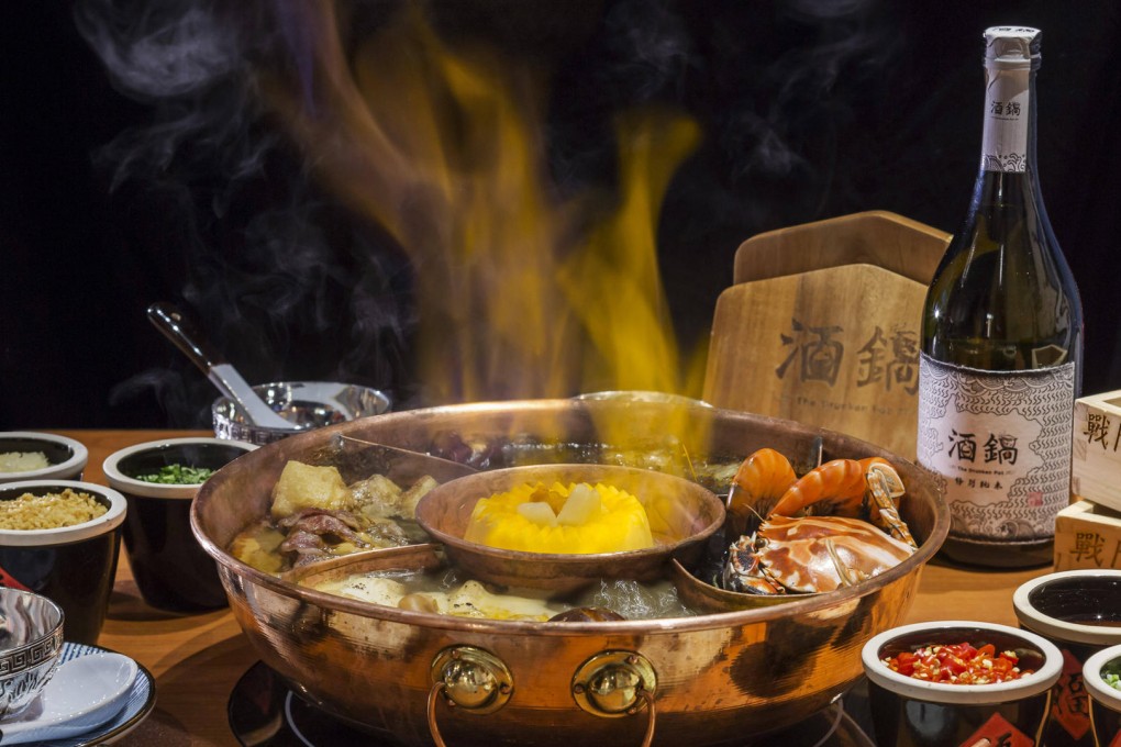 Sake adds a touch of drama to hot pot at The Drunken Pot.