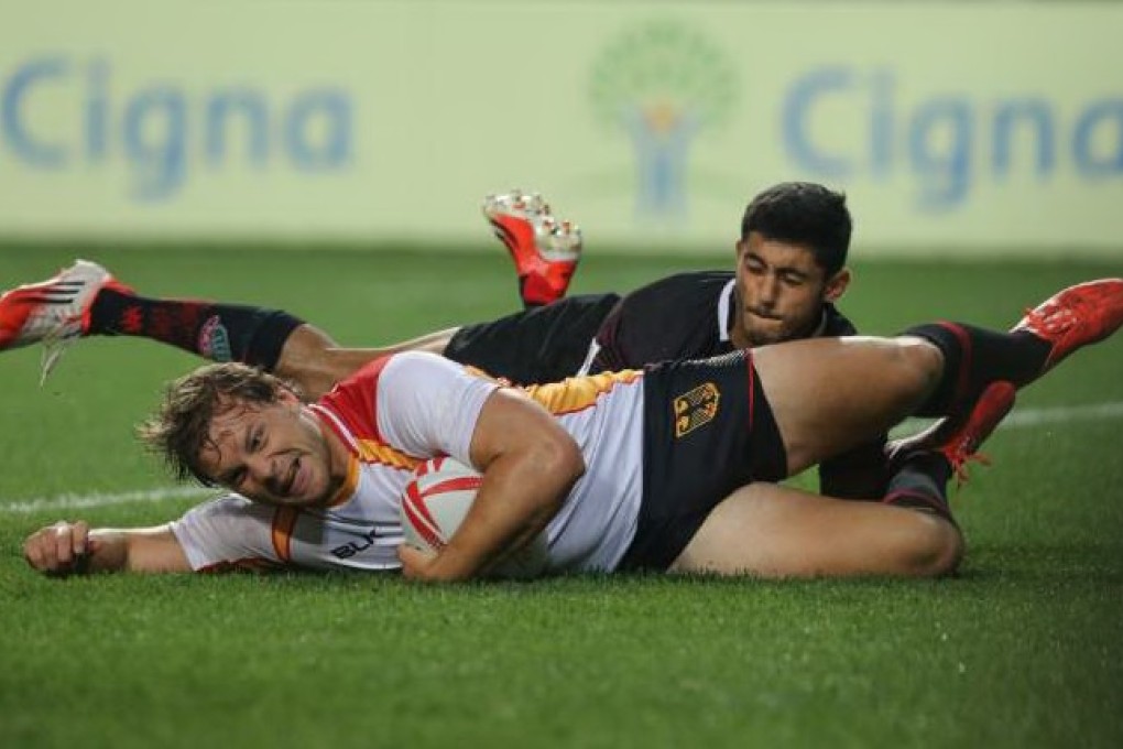 Germany's Robert Hittel breaks through the Morocco defence. Photo: Sam Tsang/SCMP