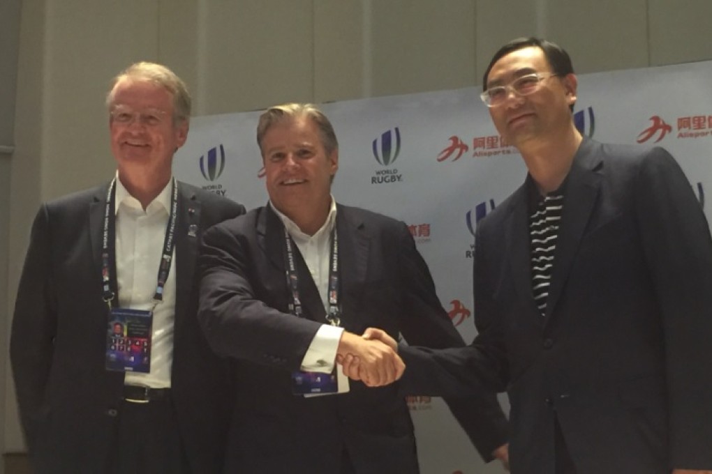 From left: World Rugby's Bernard Lapasset and Brett Gosper with Alisports CEO Zhang Dazhong at the press conference in Hong Kong. Photo: SCMP Pictures