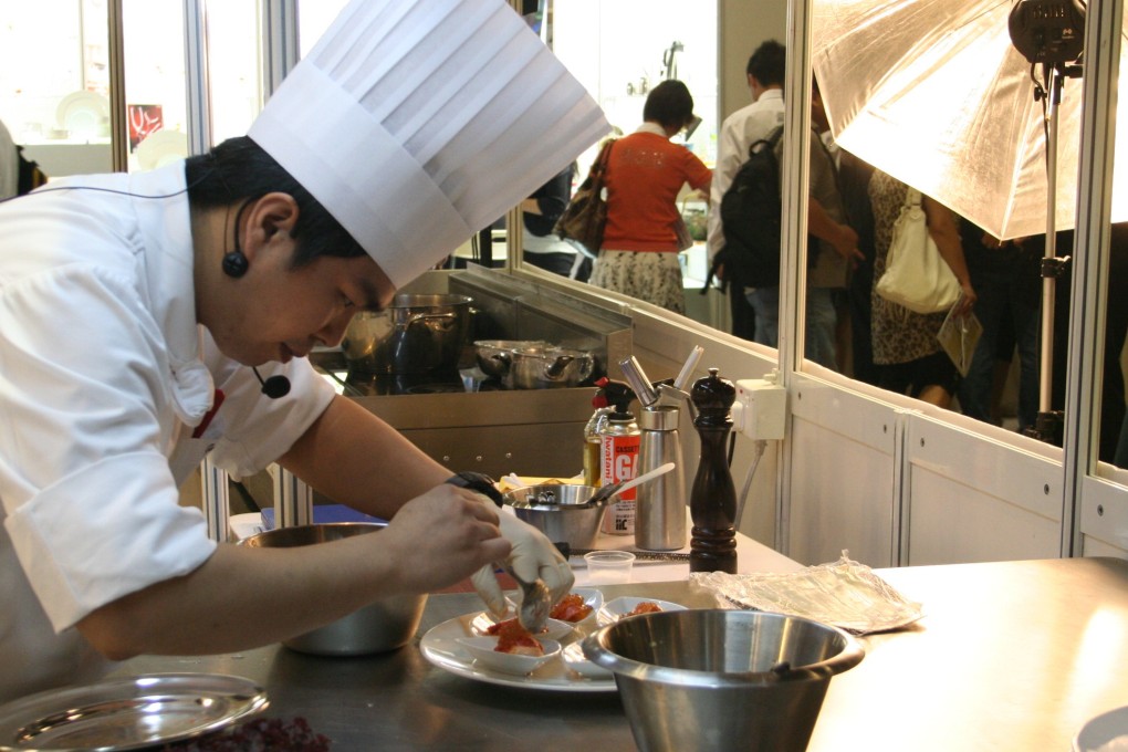 A chef works on a creation at Restaurant and Bar Hong Kong 2010.