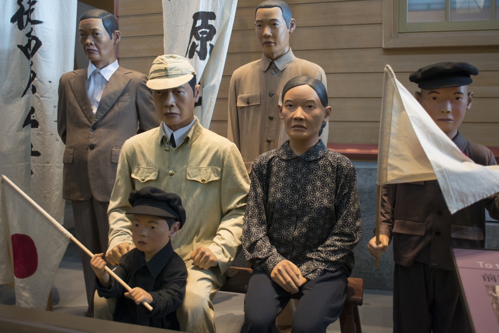 A display, representing a Taiwanese soldier about to go off to fight for Japan in the second world war, at the National Museum of Taiwan history.