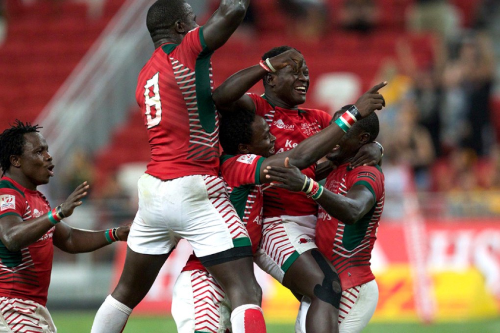 Kenya players celebrate victory over Fiji to win the 2016 Singapore Sevens on Sunday. Photo: World Rugby