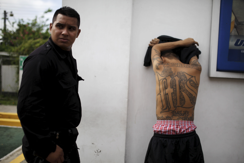 Tom Wainwright says that with full-body ink making it harder for members to work anywhere else, they often work for cheaper and can be treated however the gang likes. Photo: REUTERS/Ulises Rodriguez