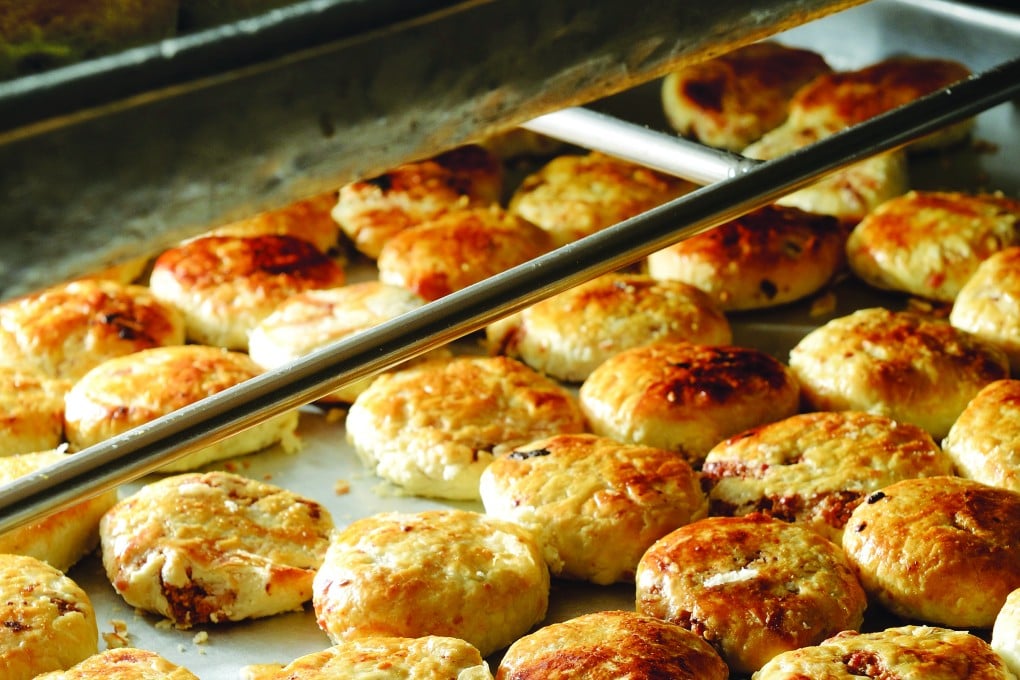 Employees at Fong Kei Pastalaria work non-stop making winter melon puffs to satisfy the demand.