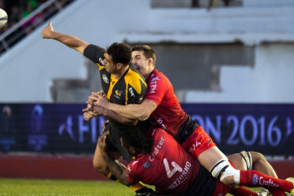 Wasps flanker George Smith gets the pass away despite being tackled by Toulon locks Jocelino Suta (bottom) and Thibault Lassalle during a European Champions Cup game in January. Australian Smith said his time assisting the England squad is nearing its end. Photos: AFP