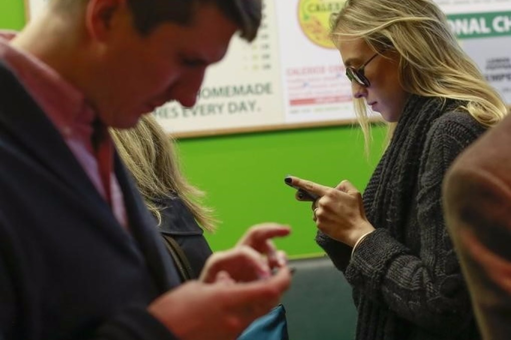 The time people in the US spend on Facebook each day has gone up by 10 minutes in the last two years. 
Photo: Reuters/Shannon Stapleton