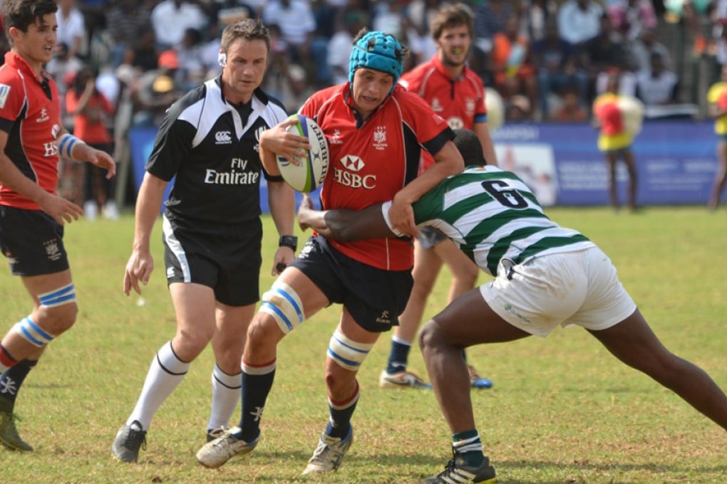 Number eight Pierce Mackinlay-West carries the ball into battle during Hong Kong’s 44-40 victory over Zimbabwe at the World Rugby U20 Trophy in Harare on Sunday. Photos: World Rugby