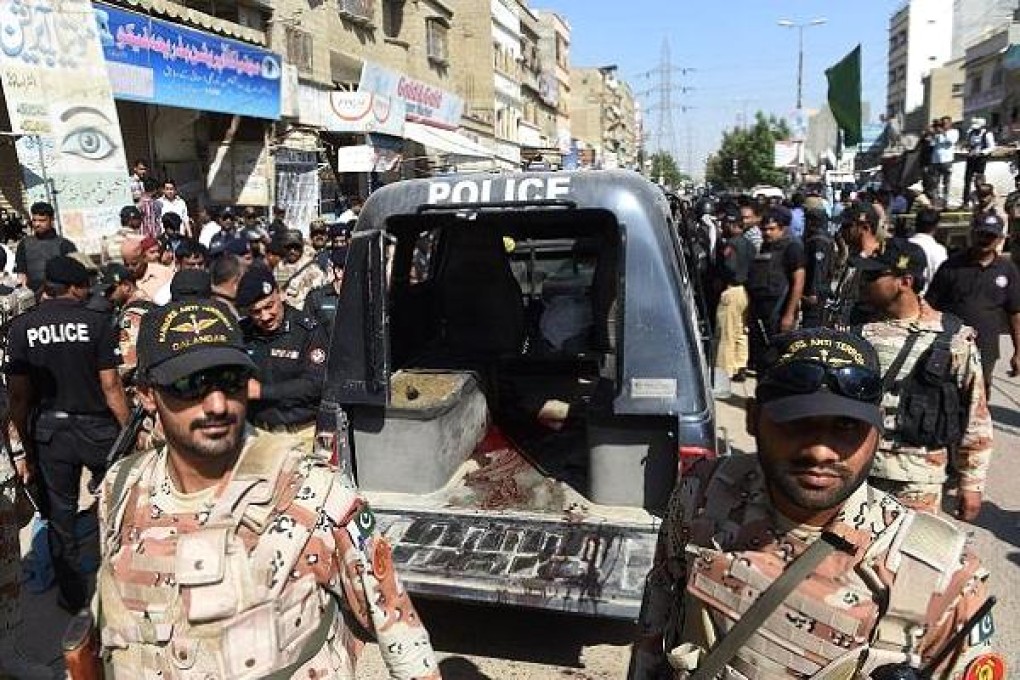 Pakistan finance chief Mohammad Ishaq Dar claims the country suffered US$4.53 billion in losses from terrorism in the 2014-2015 fiscal year. Photo: Asif Hassan/AFP/Getty Images