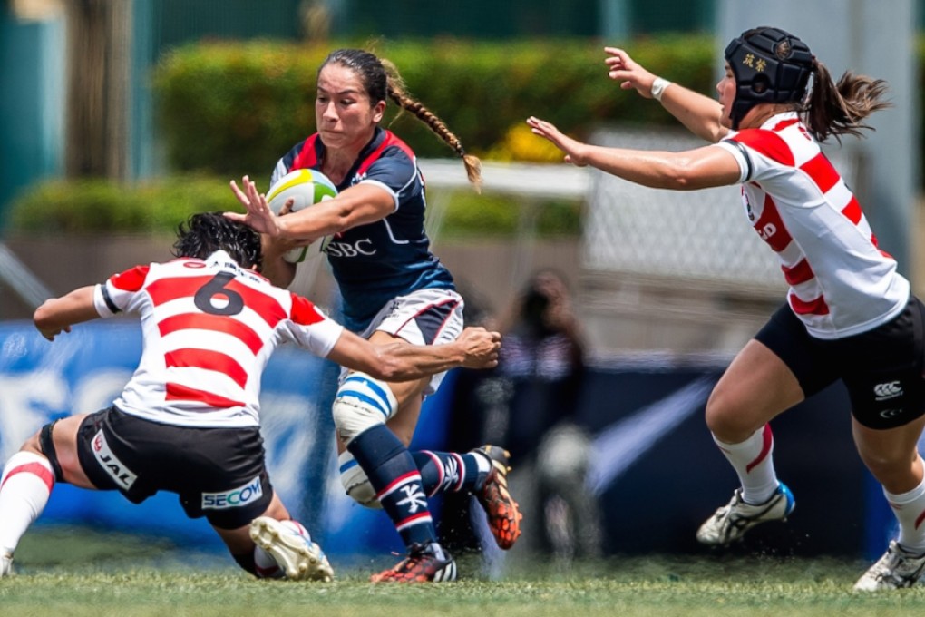 Hong Kong's Rose Fong Siu-lan charges the Japan defence but the hosts were no match for the visiting Sakura 15 who ran out 39-3 winners in their Women's Asia Rugby Championship opener on Saturday. Photos: Asia Rugby