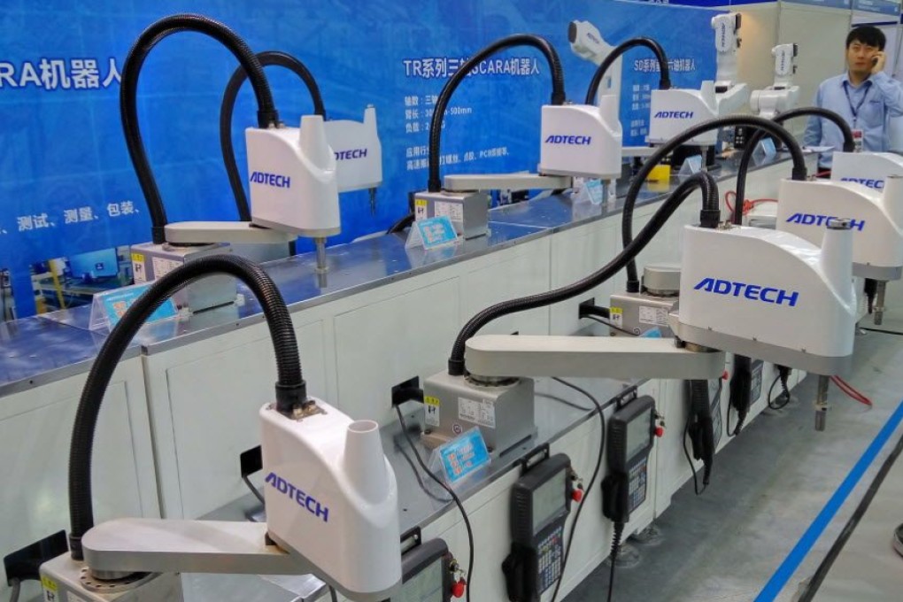 Industrial robots are becoming an increasingly common sight at manufacturing plants in China. Photo: ImagineChina