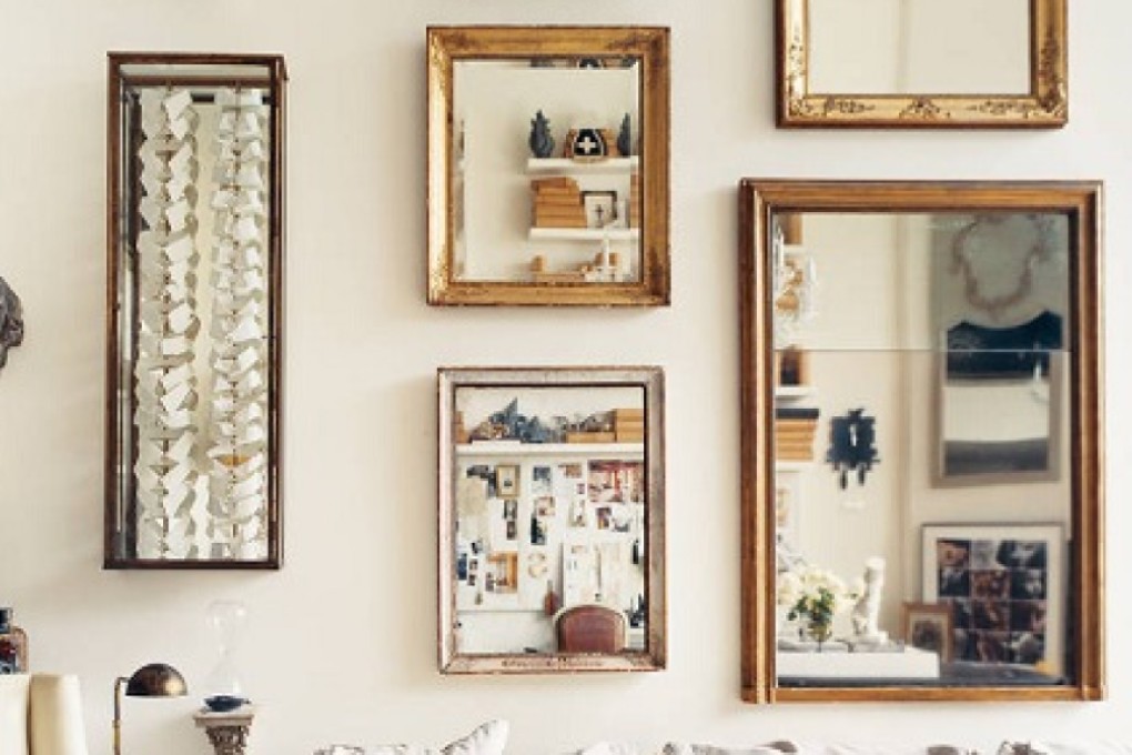 Mirrors in frames of varying shapes and sizes make an eye-catching gallery