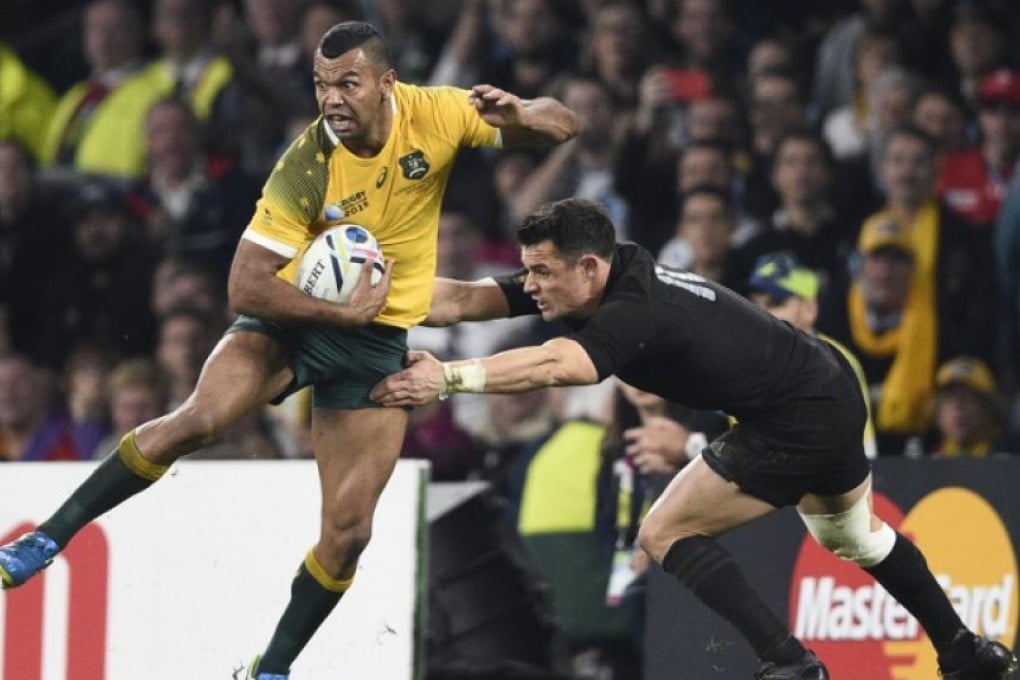 Australia fullback Kurtley Beale (left) is tackled by New Zealand fly-half Dan Carter in the final of the 2015 Rugby World Cup at Twickenham. Beale’s club side NSW Waratahs on Friday urged the utility back to reject a record-breaking deal to join England-based Wasps. Photo: AFP