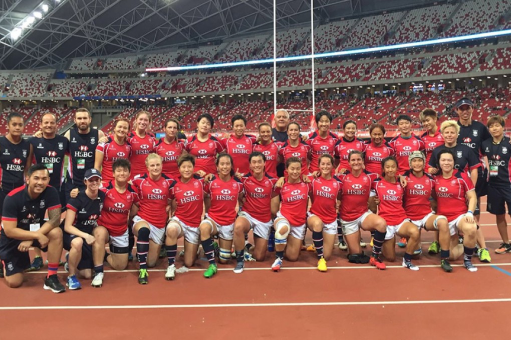 Hong Kong’s victorious women’s 15s squad get together to celebrate their 40-7 away win over Singapore at the Lion City’s new National Stadium on Saturday. Photo: HKRU