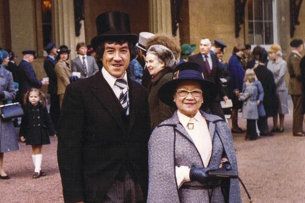 Writer Ian Gill with his mother, Louise Mary Gill, at London’s Buckingham Palace, in 1977, to receive her MBE. Photos: courtesy of the Gill family