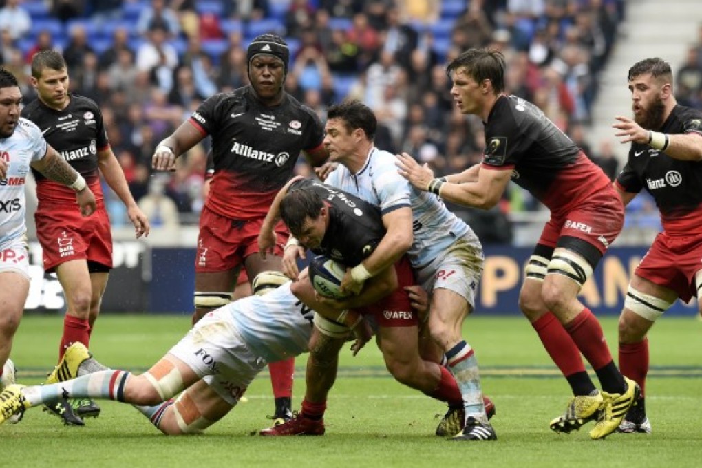 Racing 92 fly-half Dan Carter (centre-right) battles for the ball during his team’s 21-9 defeat by Saracens in the final of the European Rugby Champions Cup last weekend. Carter was carrying an injury ahead of the match and played just 43 minutes. Photos: AFP