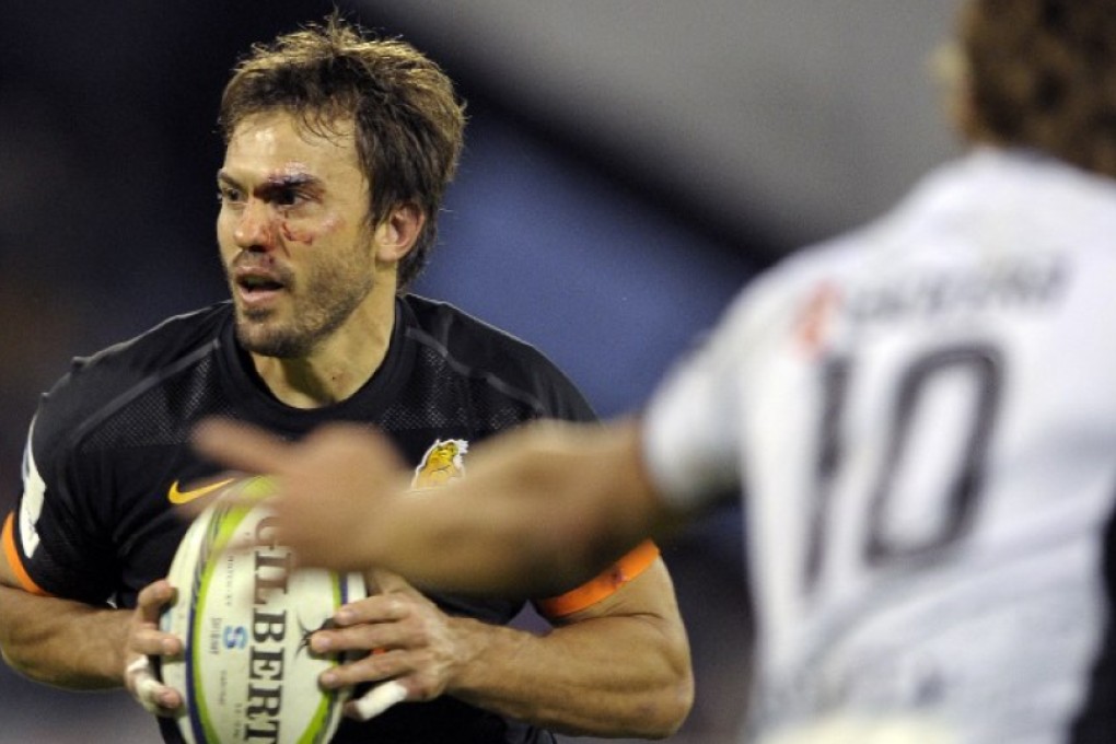 Juan Martín Hernandez of Super Rugby newcomers Jaguares from Argentina carries the ball during a game against South Africa’s Sharks in Buenos Aires. Photos: AFP