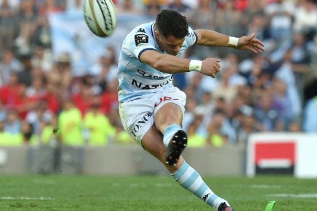 Dan Carter kicks a penalty for Racing 92 during their 29-21 Top 14 victory over Toulon at Nou Camp in Barcelona on Friday. Photos: AFP