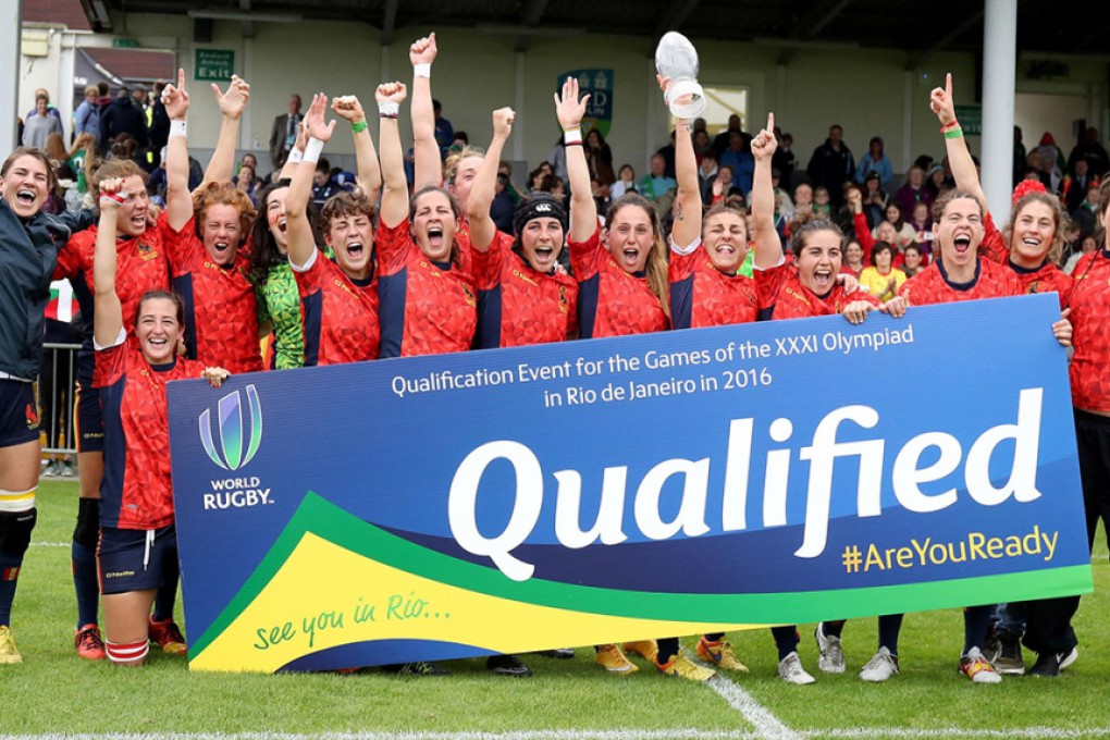 Spain celebrate after becoming the 12th and final women's qualifier for the Rio 2016 Olympic Games. Photo: World Rugby/INPHO