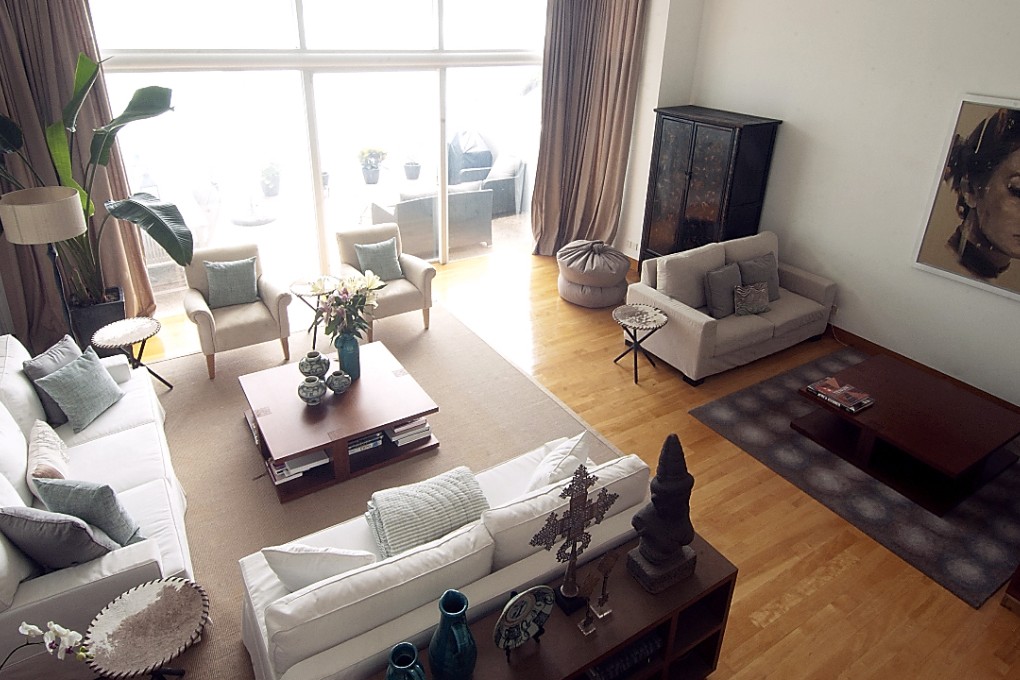 Distinct areas within the same room have been given a distinct purpose, such as the TV zone and the sitting lounge, to make the space more manageable. Photo: Courtesy of Nicole Cromwell