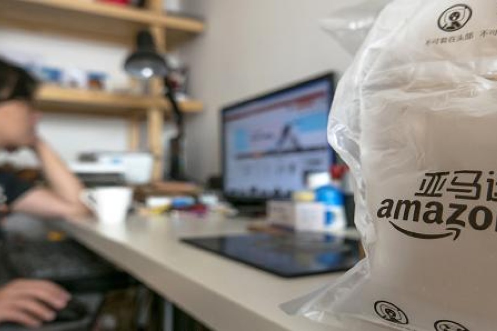 A girl buying goods from Amazon.cn. Photo: Kevin Winter/Getty Images