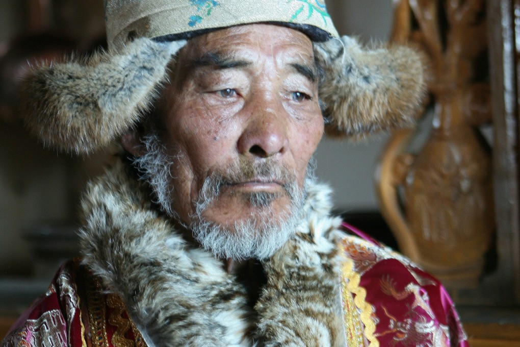 Denyoun Tsering, 80, one of the last remaining muleteers to have plied the Southern Silk Road, wearing his Tibetan clothes at home in Shangri-La, Yunnan. Photo: Paul Mooney