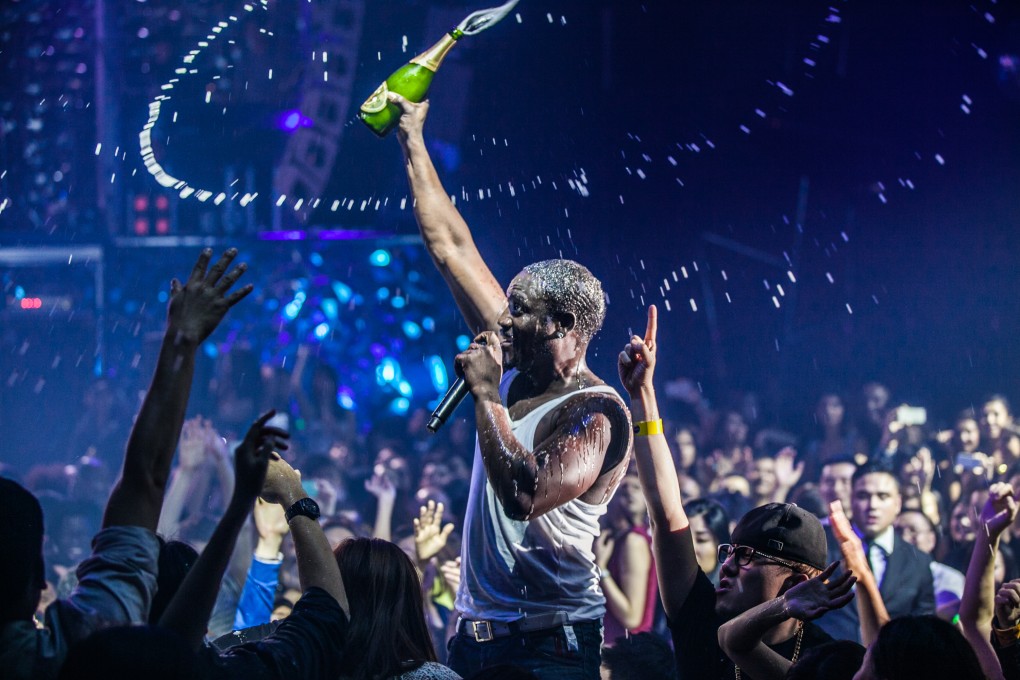 US R&B star Akon takes to the stage at Club Cubic in Macau.