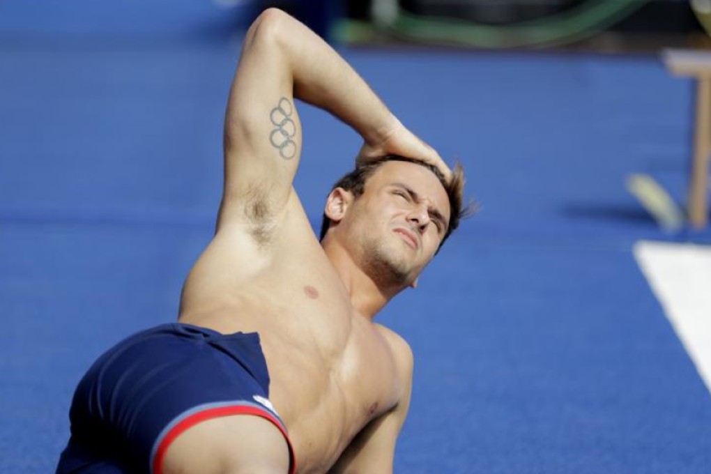 Britain’s Tom Daley stretches during a training session at the Maria Lenk Aquatics Centre in Rio’s Olympic Park on Thursday. Photo: AP